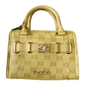 Women’s Bebe blonde “Evie Top” Monogram bag.